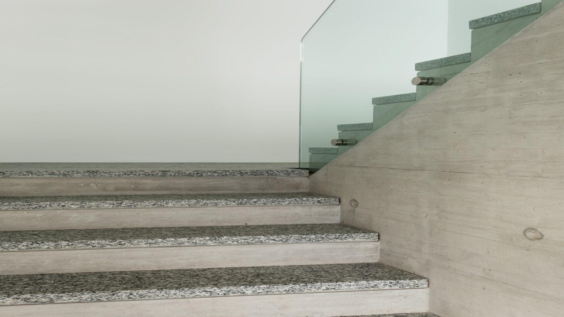 Modern building, granite staircase, interior