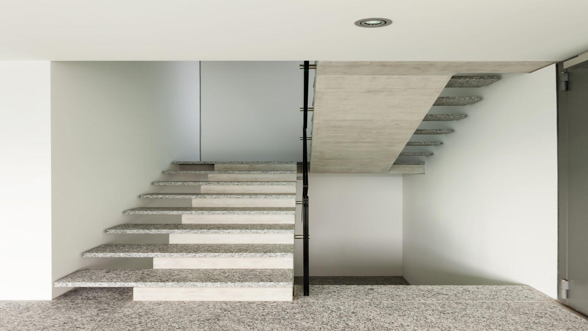 Modern building, granite staircase, interior